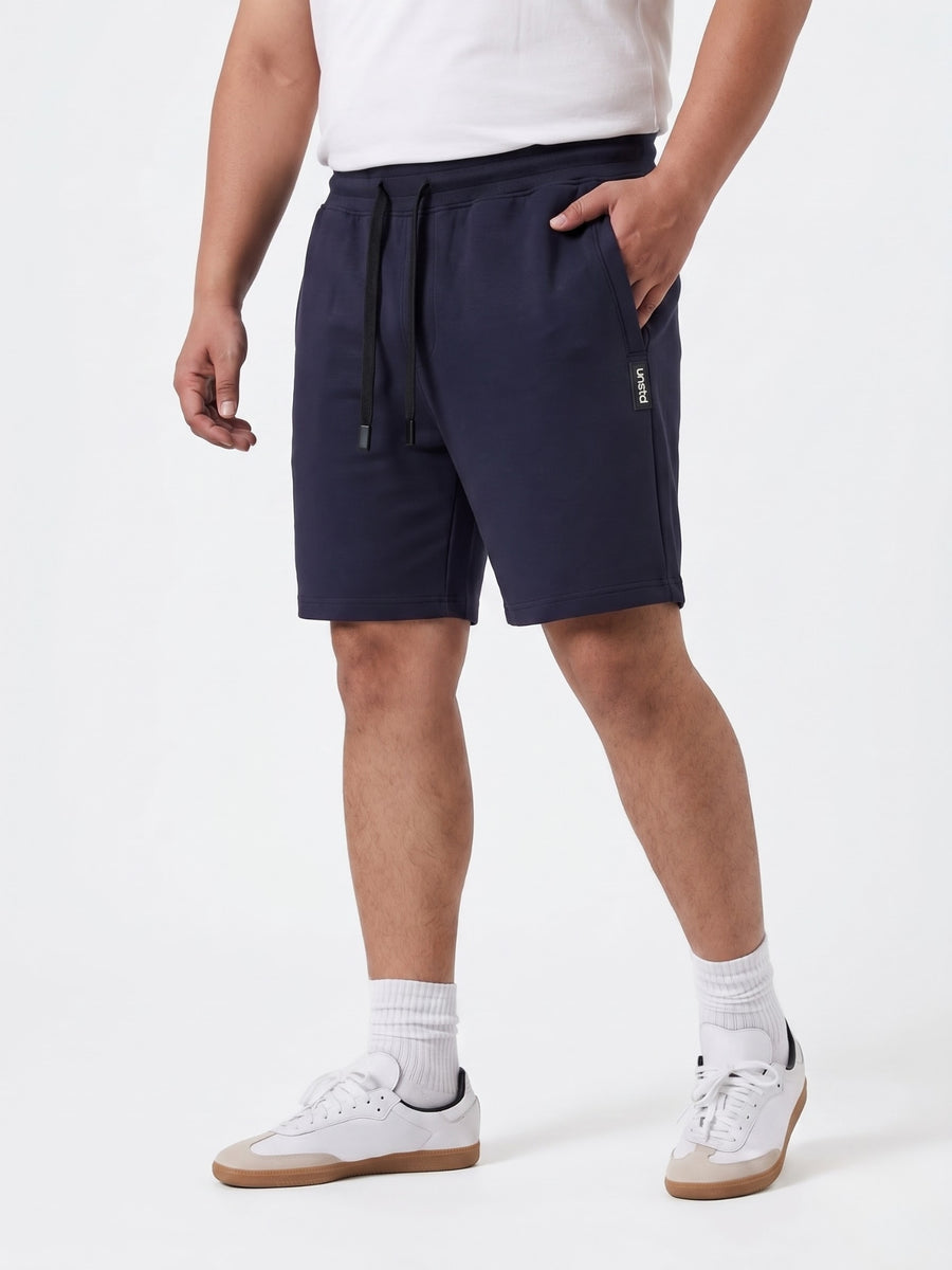 Plus Size French Terry Mid-Rise Shorts with Zip Pocket