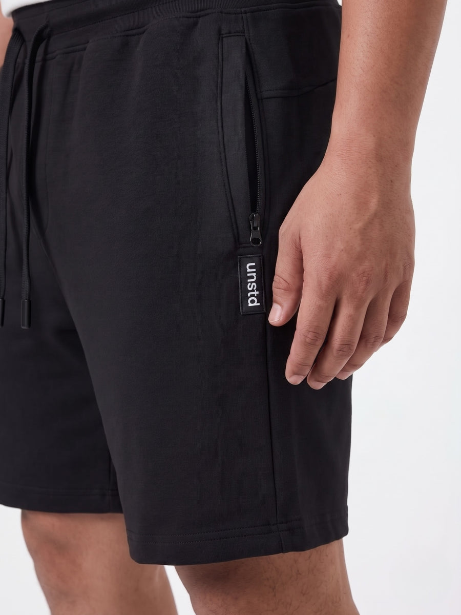 Plus Size French Terry Mid-Rise Shorts with Zip Pocket